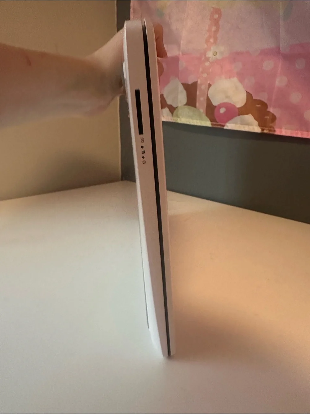 HP White Laptop with Silver Logo — Lightweight Design